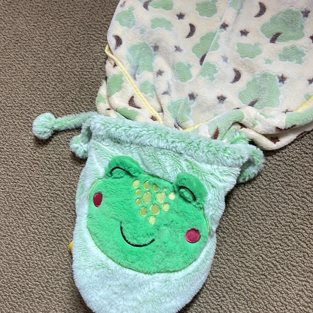 Frog backpack blanket. Very cute and soft.